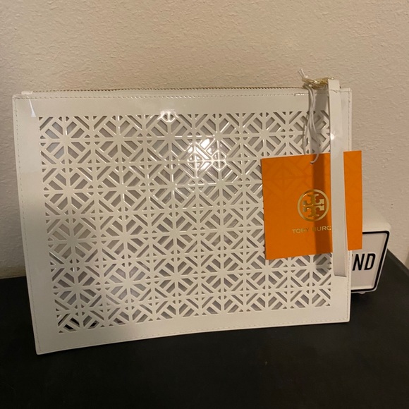 Tory Burch Handbags - Tory Burch Perforated White Clutch Wristlet